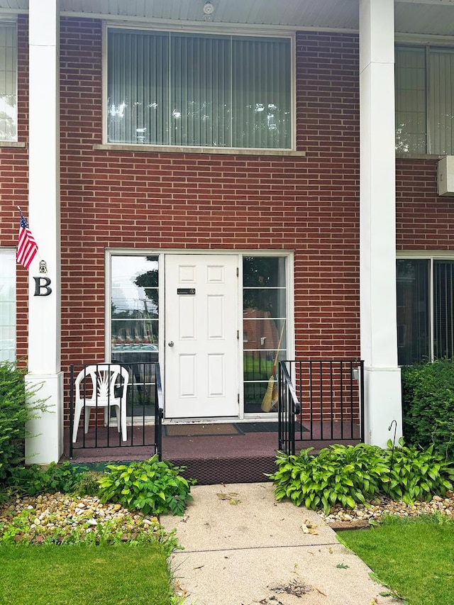 124 N Whistler Ave Unit B8, Freeport, IL 61032 - entrance to property featuring brick siding