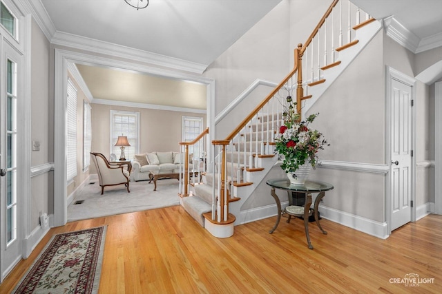 40W065 Fox Mill Blvd, Saint Charles, IL 60175 - entrance foyer with wood finished floors, stairs, baseboards, and crown molding