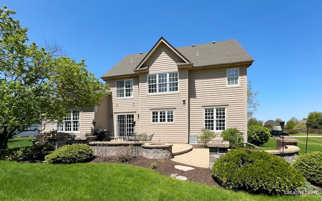 40W065 Fox Mill Blvd, Saint Charles, IL 60175 - back of house featuring a patio, a yard, and a shingled roof