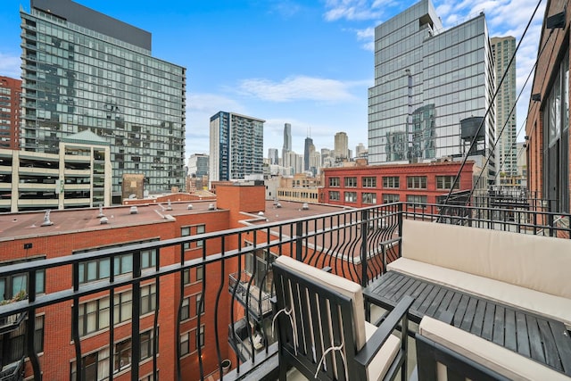 balcony featuring a view of city