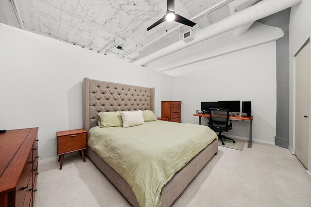 bedroom with visible vents, baseboards, ceiling fan, and light colored carpet