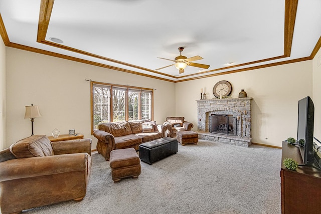 living room featuring carpet flooring, ceiling fan, and ornamental molding