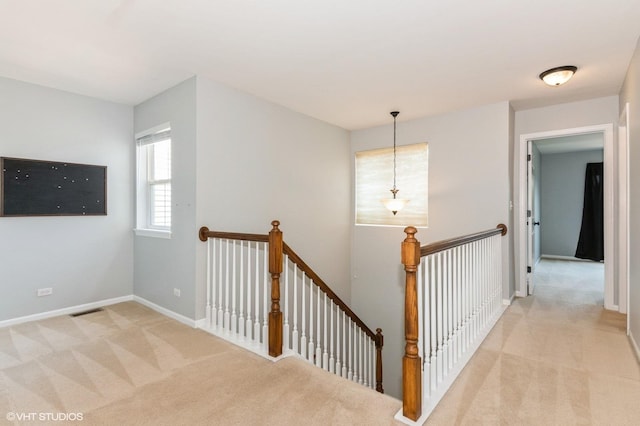 305 Fairmont Ct Unit 305, Saint Charles, IL 60175 - hallway featuring an upstairs landing and light carpet