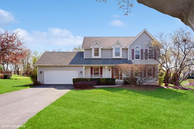 view of front facade featuring covered porch, a garage, a front lawn, concrete driveway, and roof with shingles