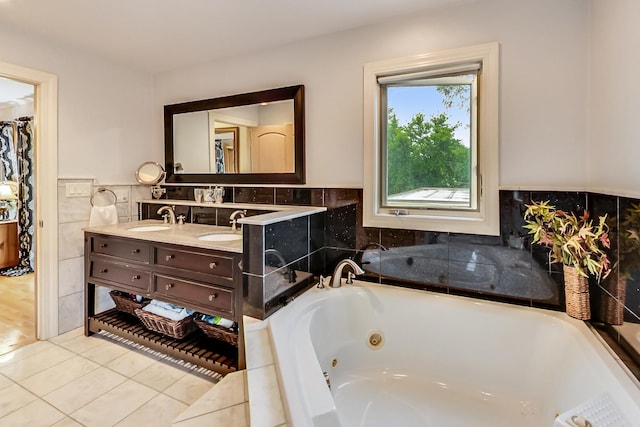 2609 Eisenhower Dr, Des Plaines, IL 60018 - full bath featuring double vanity, tile patterned floors, a jetted tub, and tile walls