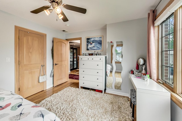 2609 Eisenhower Dr, Des Plaines, IL 60018 - bedroom featuring wood finished floors and a ceiling fan