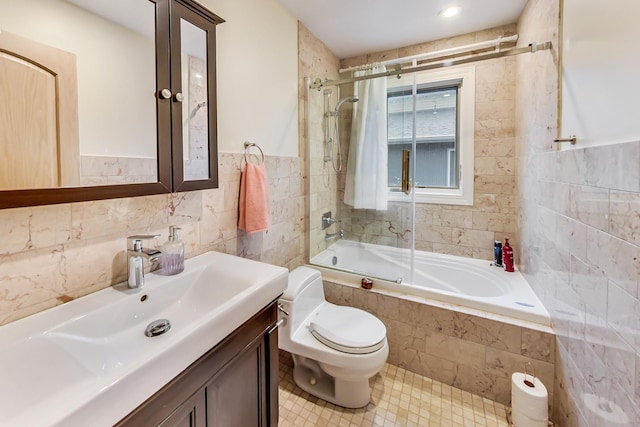 2609 Eisenhower Dr, Des Plaines, IL 60018 - full bath with tile walls, vanity, tiled shower / bath, tile patterned floors, and wainscoting