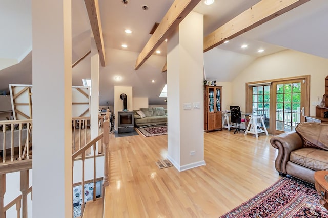 2609 Eisenhower Dr, Des Plaines, IL 60018 - living area featuring light wood finished floors, recessed lighting, and a wood stove