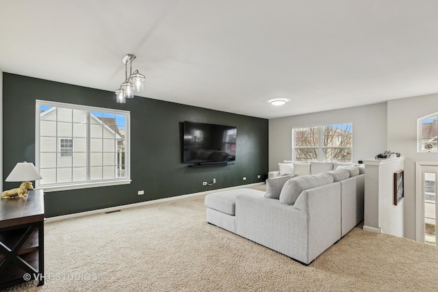 living room featuring carpet and visible vents