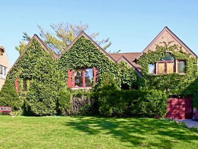 8209 N Oleander Ave, Niles, IL 60714 - tudor home with a front yard