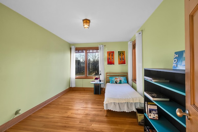8209 N Oleander Ave, Niles, IL 60714 - bedroom with light wood-style floors