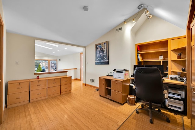 8209 N Oleander Ave, Niles, IL 60714 - home office with lofted ceiling and light wood-type flooring