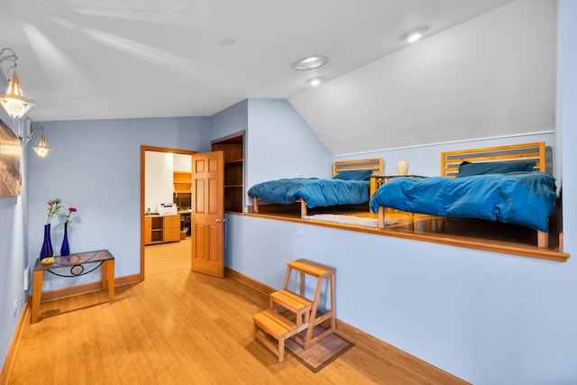 8209 N Oleander Ave, Niles, IL 60714 - bedroom featuring vaulted ceiling and light wood finished floors