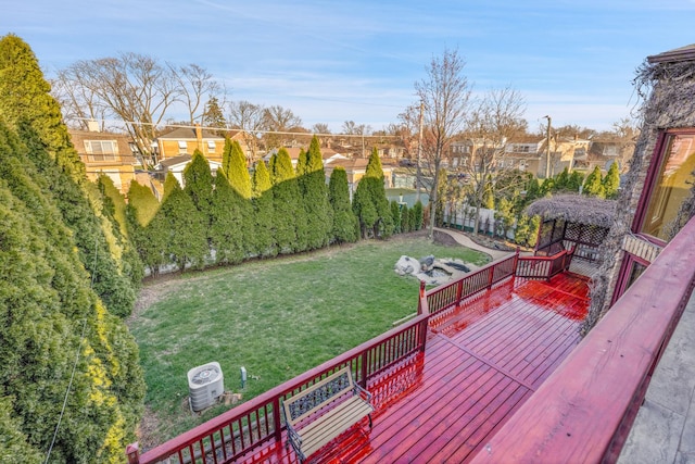 8209 N Oleander Ave, Niles, IL 60714 - wooden terrace featuring a residential view, a lawn, and central air condition unit