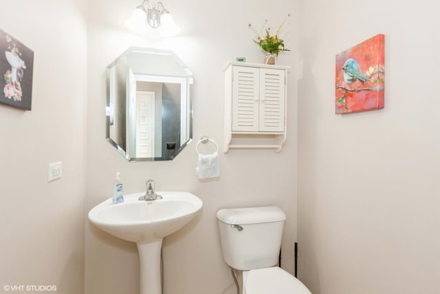 half bathroom with toilet