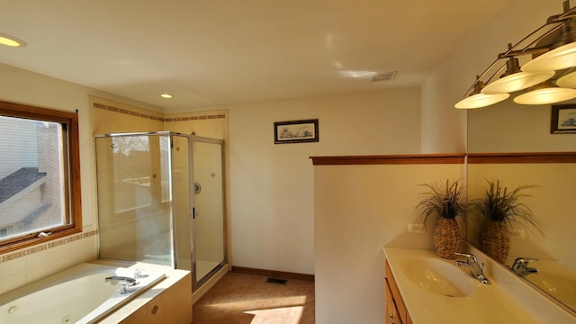 bathroom with a shower stall, visible vents, recessed lighting, a tub with jets, and vanity