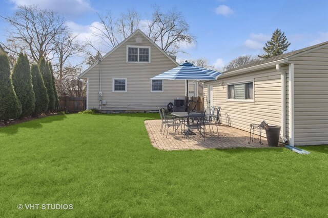 137 S Hickory St, Palatine, IL 60067 - rear view of property featuring a lawn, a patio, and fence