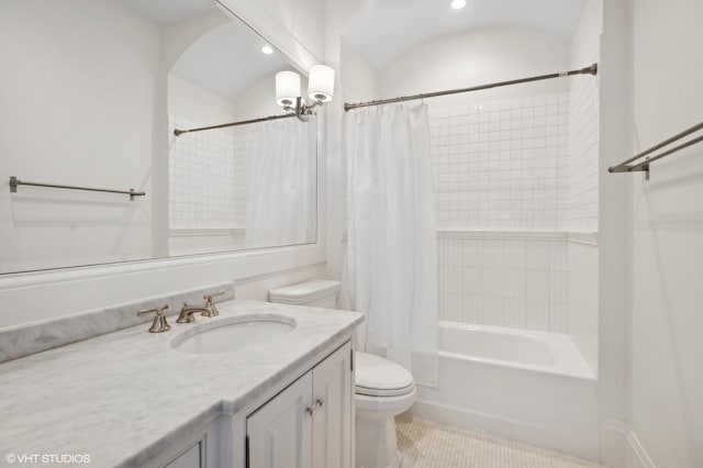 full bath with tile patterned floors, shower / bathtub combination with curtain, vanity, and toilet