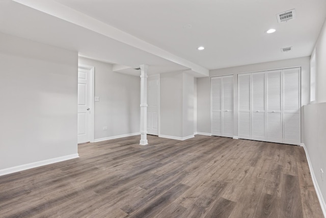 interior space with recessed lighting, visible vents, baseboards, and wood finished floors