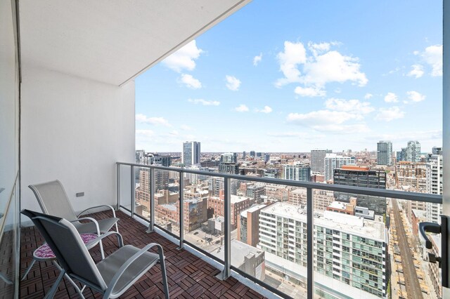 balcony featuring a city view