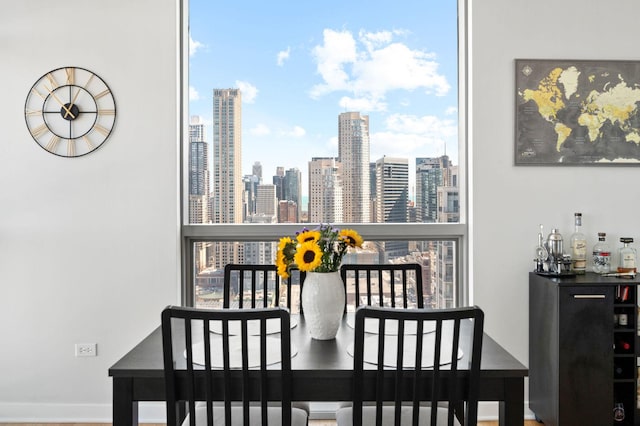 dining space featuring a city view