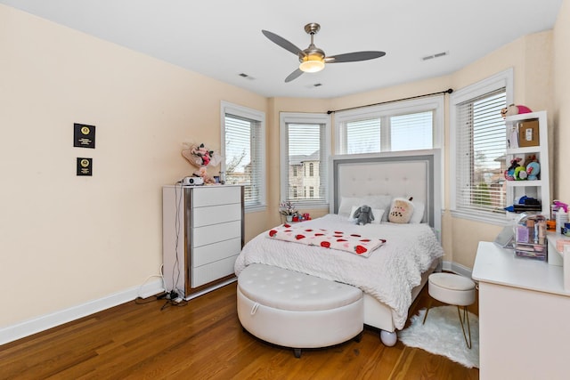 5305 Farwell Ave, Skokie, IL 60077 - bedroom featuring visible vents, baseboards, a ceiling fan, and wood finished floors