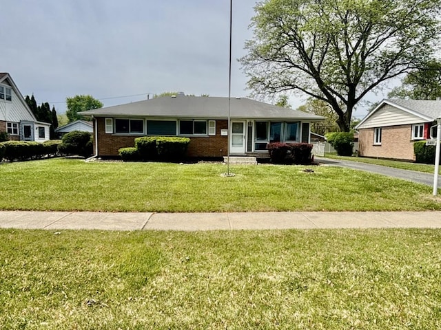 8400 Latrobe Ave, Burbank, IL 60459 - view of front of property featuring a front lawn and brick siding