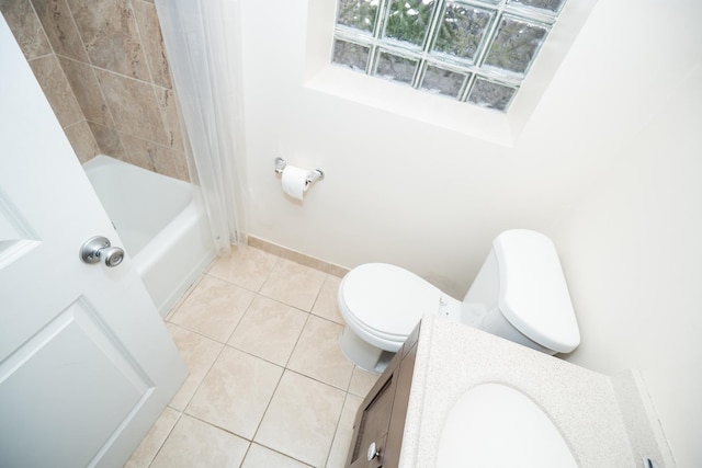 full bath featuring toilet, tile patterned floors, baseboards, and shower / tub combo with curtain