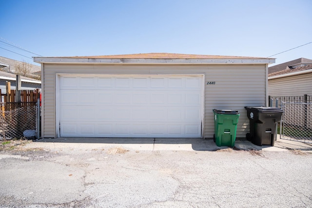 detached garage with fence
