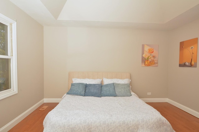 241 Butte View Dr N, Bolingbrook, IL 60490 - bedroom with baseboards, vaulted ceiling, and wood finished floors