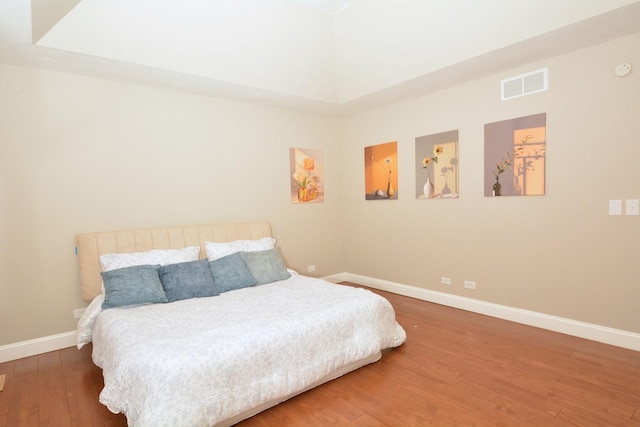 241 Butte View Dr N, Bolingbrook, IL 60490 - bedroom with wood finished floors, baseboards, and visible vents