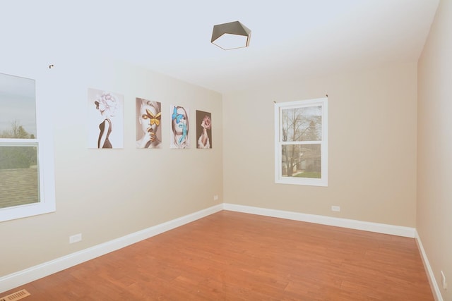 241 Butte View Dr N, Bolingbrook, IL 60490 - spare room with light wood-style floors, baseboards, and visible vents