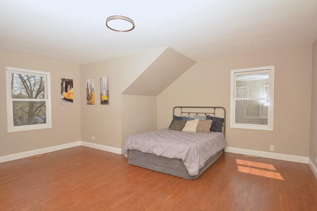 241 Butte View Dr N, Bolingbrook, IL 60490 - bedroom featuring baseboards and wood finished floors