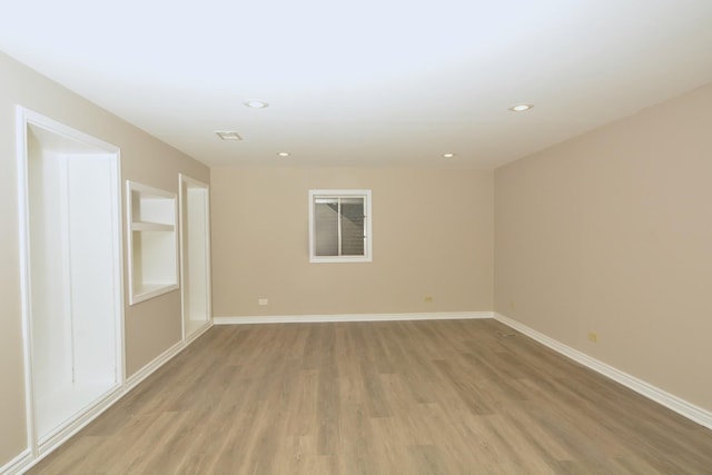 241 Butte View Dr N, Bolingbrook, IL 60490 - spare room with light wood-style floors, baseboards, and recessed lighting