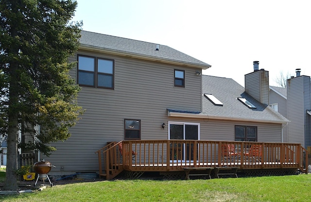 241 Butte View Dr N, Bolingbrook, IL 60490 - rear view of property featuring roof with shingles, a wooden deck, and a lawn