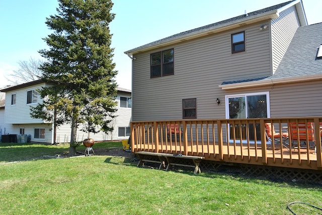 241 Butte View Dr N, Bolingbrook, IL 60490 - rear view of property featuring roof with shingles, a wooden deck, and a lawn