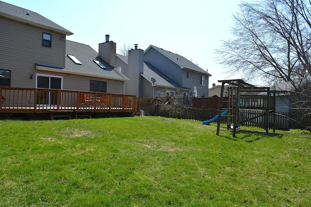 241 Butte View Dr N, Bolingbrook, IL 60490 - view of yard with fence, a deck, and a playground