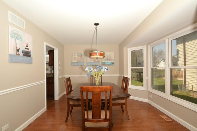 241 Butte View Dr N, Bolingbrook, IL 60490 - dining area featuring visible vents, baseboards, plenty of natural light, and wood finished floors