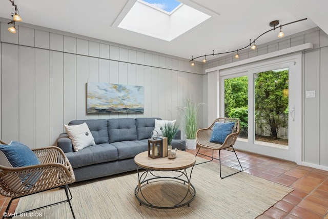 1115 S Vail Ave, Arlington Heights, IL 60005 - living area featuring a skylight, rail lighting, and tile patterned flooring