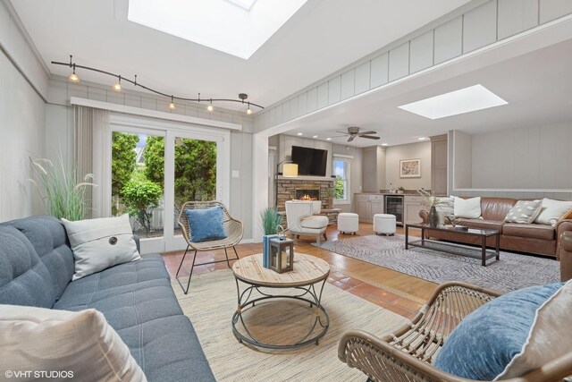 1115 S Vail Ave, Arlington Heights, IL 60005 - living area featuring a skylight, beverage cooler, healthy amount of natural light, and a fireplace