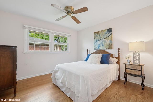 1115 S Vail Ave, Arlington Heights, IL 60005 - bedroom with wood finished floors, baseboards, and ceiling fan