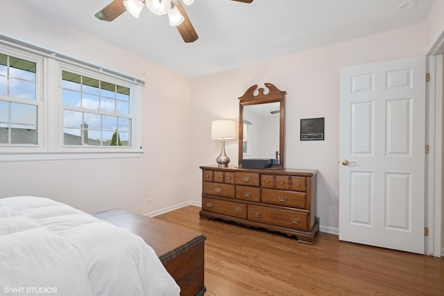 1115 S Vail Ave, Arlington Heights, IL 60005 - bedroom with wood finished floors, baseboards, and ceiling fan