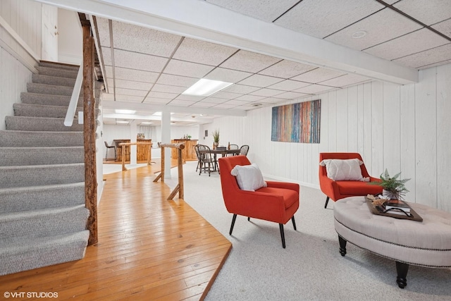 1115 S Vail Ave, Arlington Heights, IL 60005 - sitting room with stairway, hardwood / wood-style flooring, a paneled ceiling, and wood walls
