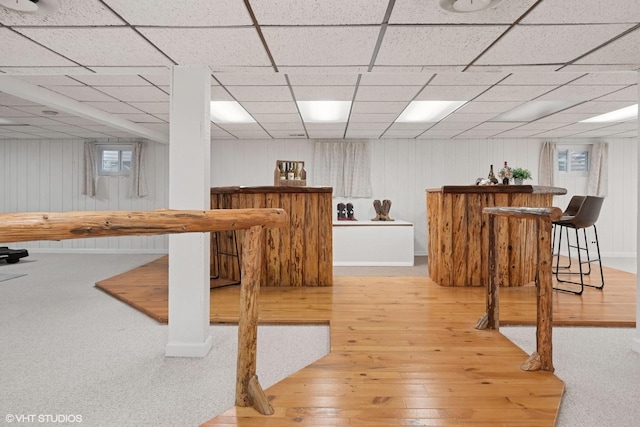 1115 S Vail Ave, Arlington Heights, IL 60005 - indoor dry bar featuring hardwood / wood-style flooring, a drop ceiling, and wooden walls