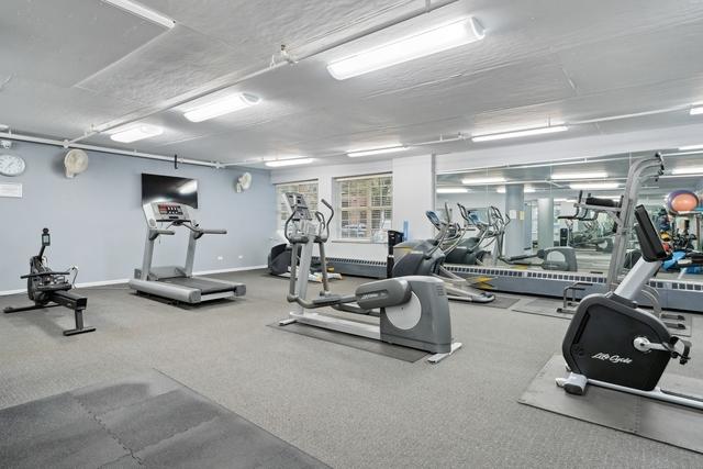 21 W Chestnut St Unit 1509, Chicago, IL 60610 - workout area with baseboards and carpet