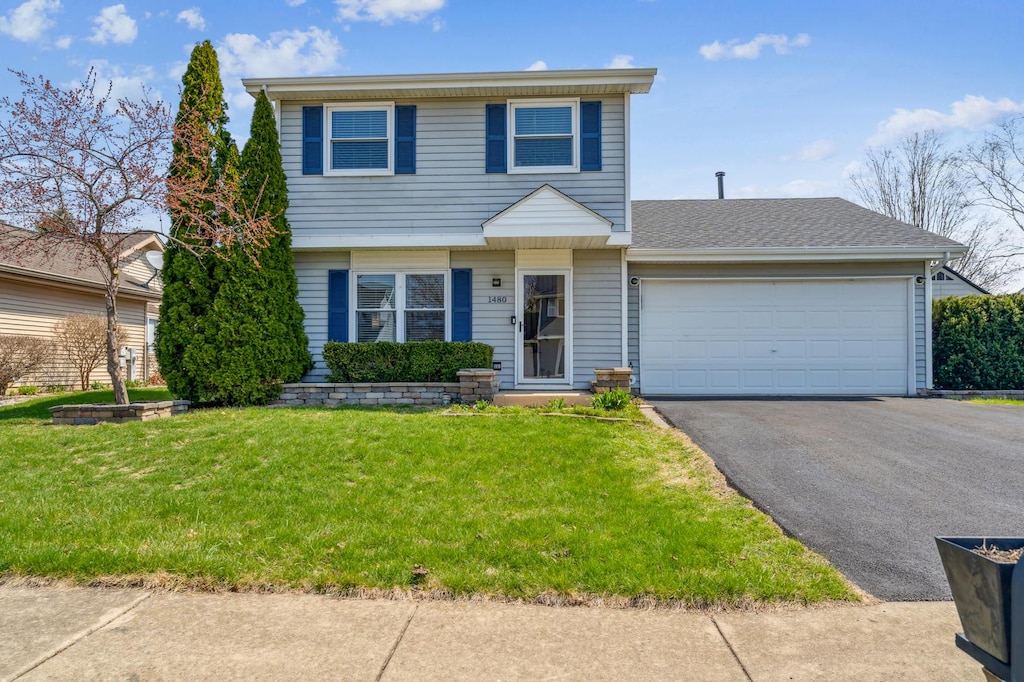 1480 Bangor Ln, Aurora, IL 60504 - view of front of home with aphalt driveway, an attached garage, and a front yard