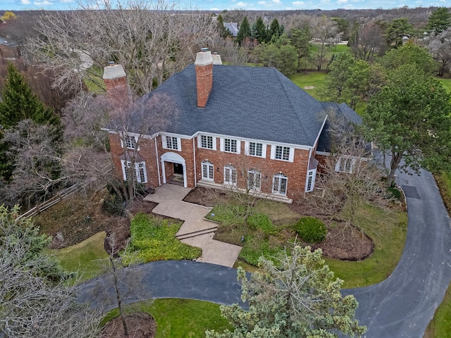 8 Longwood Dr, Burr Ridge, IL 60527 - colonial house with brick siding and a chimney
