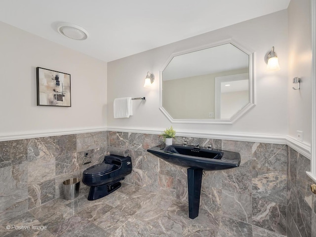 8 Longwood Dr, Burr Ridge, IL 60527 - half bath featuring wainscoting, a sink, and toilet