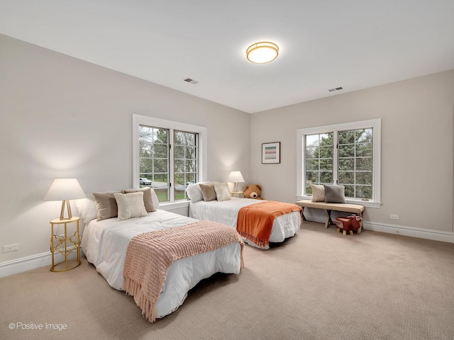 8 Longwood Dr, Burr Ridge, IL 60527 - bedroom featuring baseboards, multiple windows, and light colored carpet