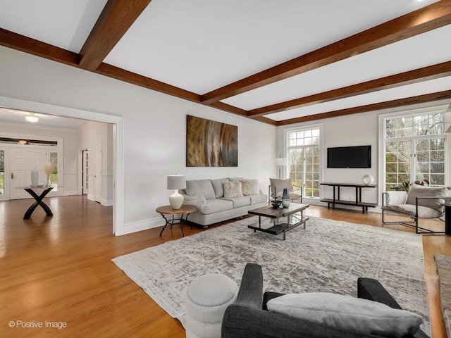 8 Longwood Dr, Burr Ridge, IL 60527 - living area featuring light wood finished floors, baseboards, and beam ceiling